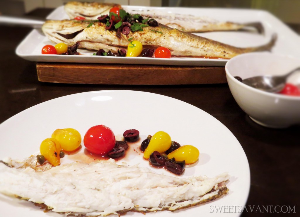 How To Cook Whole Roasted Fish whole roasted branzino fish with olives and cherry tomatoes sweetsavant.com America's best food blog